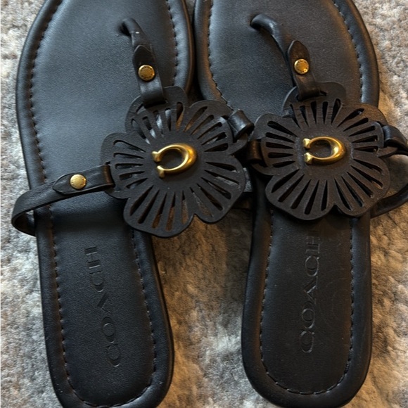 Coach Shoes - Coach Black Leather Floral Cutout Sandal with Gold Accent
